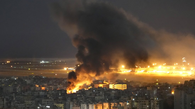 Flames and smoke rise form an Israeli airstrike on Dahiyeh, in the southern suburb of Beirut, Lebanon, Sunday, Oct. 20, 2024. (AP Photo/Hussein Malla)